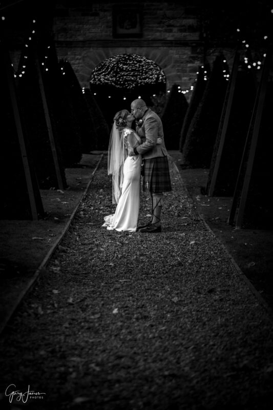 Black and White Evening Shot of the Bride & Groom at Prestonfield House